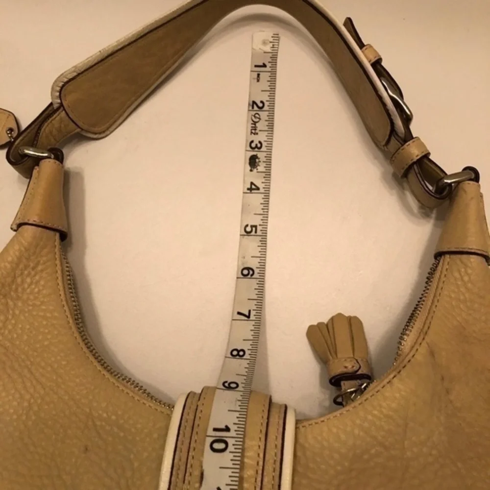 Coach cream pebbled leather perforated hobo bag